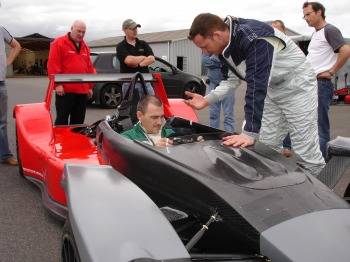 Graham Halstead engineering director Caparo Vehicle Technologies (in the cockpit) discusses test 
procedures with design director Ben Scott-Geddes (leaning over the cockpit) 
before taking the Caparo T1 prototype out for its very first run.