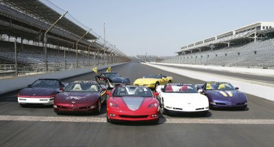 2005 Corvette convertible Indianapolis 500 pace car 
accompanied by six previous Corvette Indy 500 pace cars