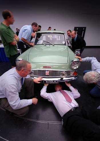 Dunton engineers pore over product development 1960s style with Ford's 1966 Anglia 105E
