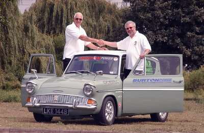 John Bowers (left) and Roy Springate with their Ford Anglia 
before setting off for Moscow