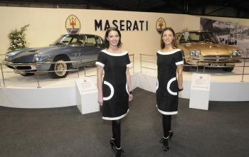 The Maserati stand at the replicated Earls Court Motor Show at the 2008 Goodwood Revival, featuring 60s 'costumes' (Copyright image)