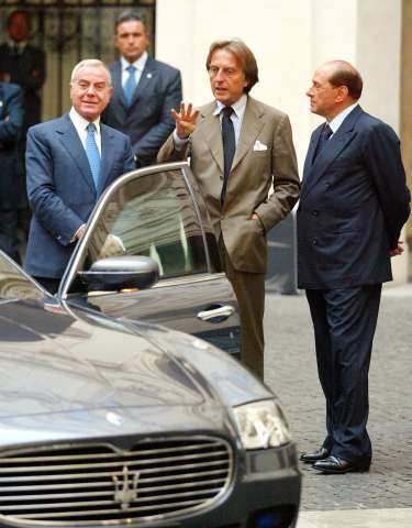 Italian Prime Minister Berlusconi takes delivery of a Maserati Quattroporte