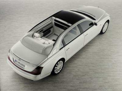 Maybach Landaulet Study: Opening and closing the roof takes 16 seconds. The 
folded roof can be enclosed with a fitted white leather cover. Whilst the 
drivers compartment is black, the rear is upholstered in white leather, with 
decorative trim in glossy, black piano lacquer and exclusive black granite.