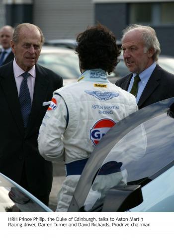 HRH Prince Philip, the Duke of Edinburgh (left), visited Prodrive on Thursday 28th Novmber, 2007 - 
pictured here with Darren Turner (centre, in racing suit) and David Richards (right) (copyright image)