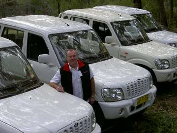 Team member, Ken Walker 
with a Mahindra Pikup line-up, out in the bush 
Location: Bowral, NSW